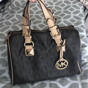 Michael Kors monogram barrel bag